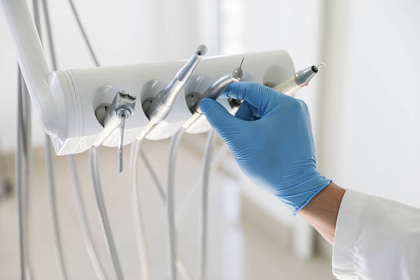 Professional Tooth Extraction technician working in Pine Island Center, FL